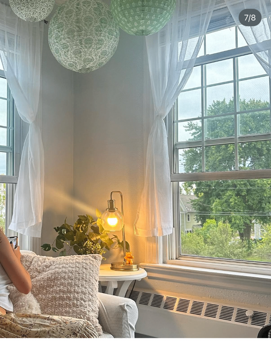 Reading nook with warm lamp and lanterns