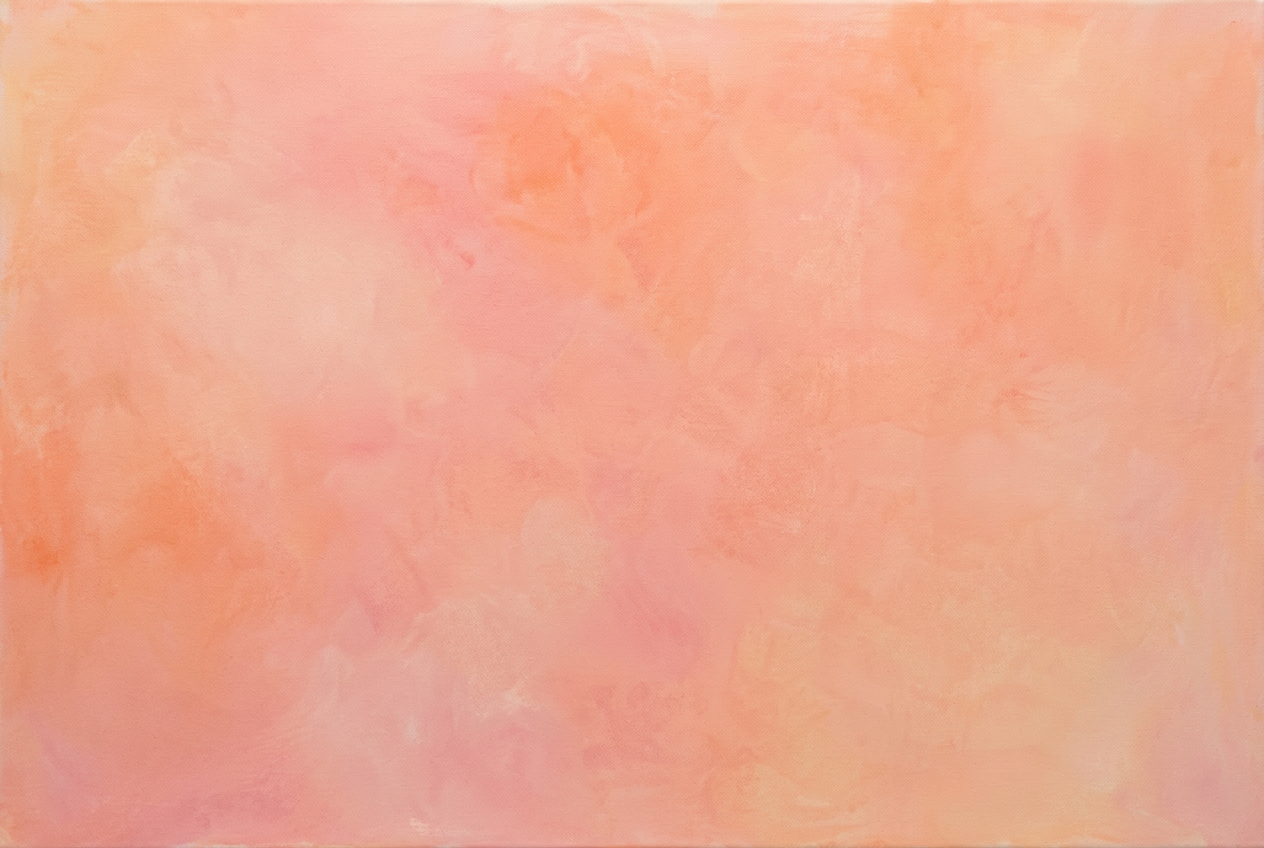 Detail of a peach and coral acrylic painting with soft washes of pigment across the canvas.